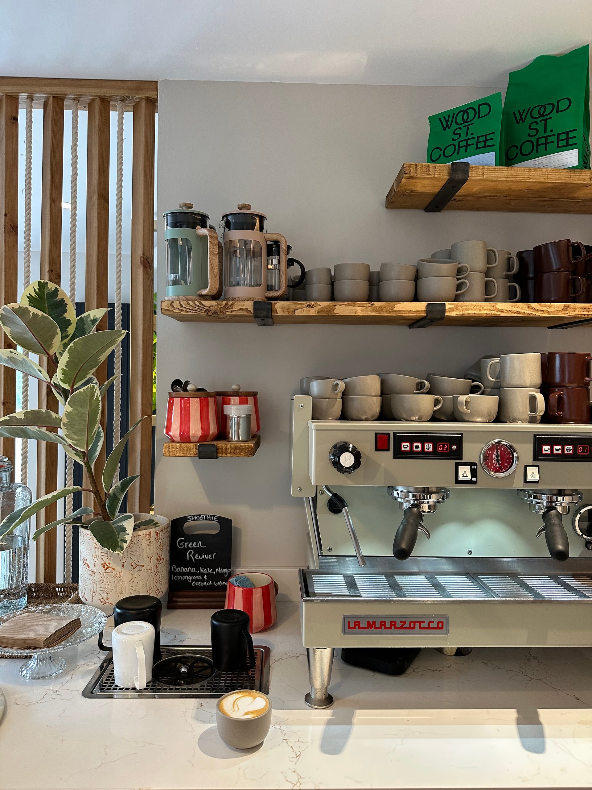 Joy's espresso machine and a freshly made coffee